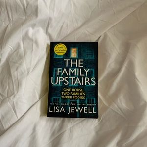 Paperback Copy of “The Family Upstairs”